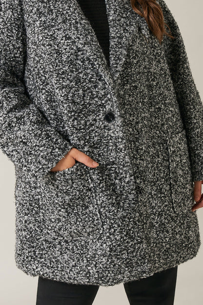 Manteau habillé gris bouclé