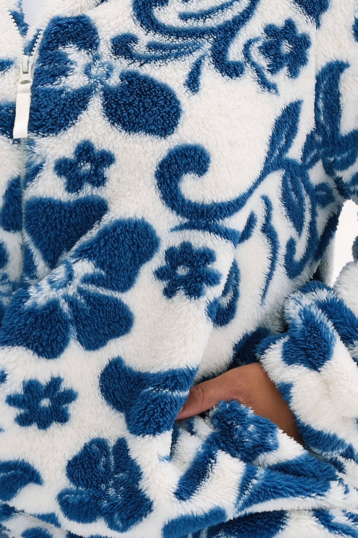 Veste polaire blanche à fleurs