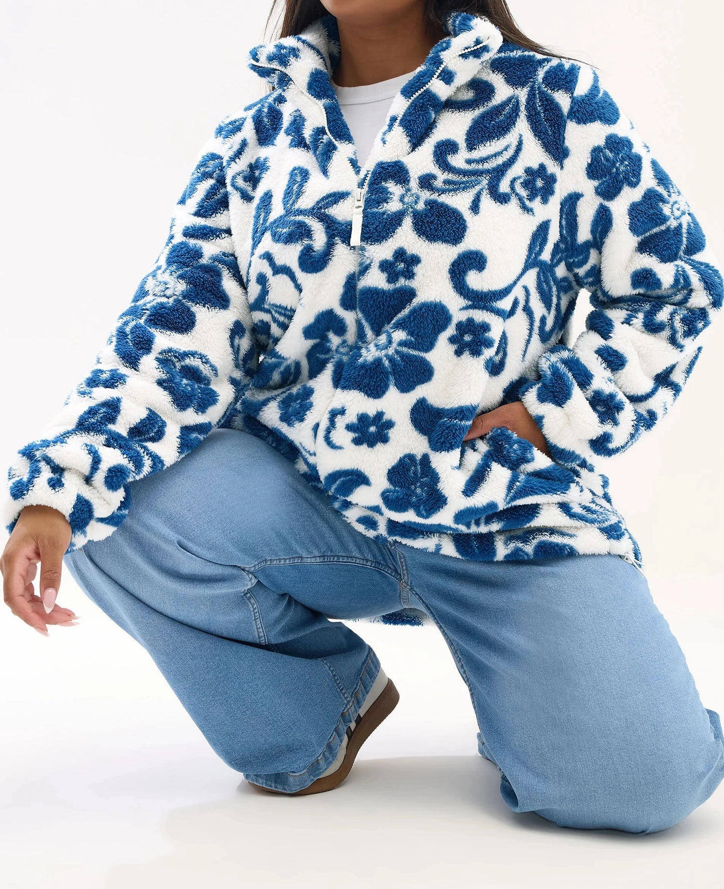 Veste polaire blanche à fleurs