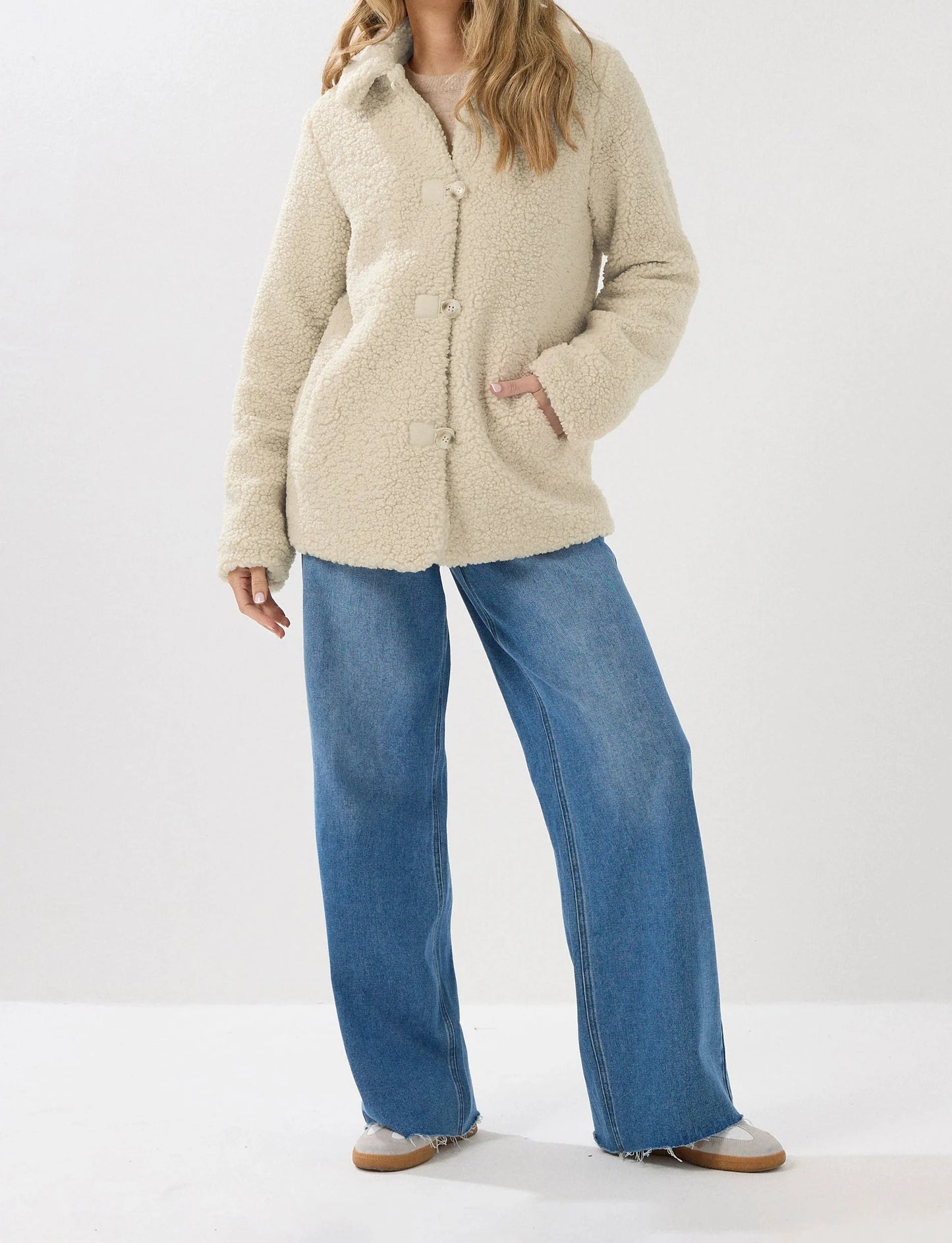 Veste polaire beige à boutons