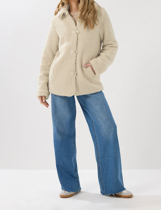 Veste polaire beige à boutons